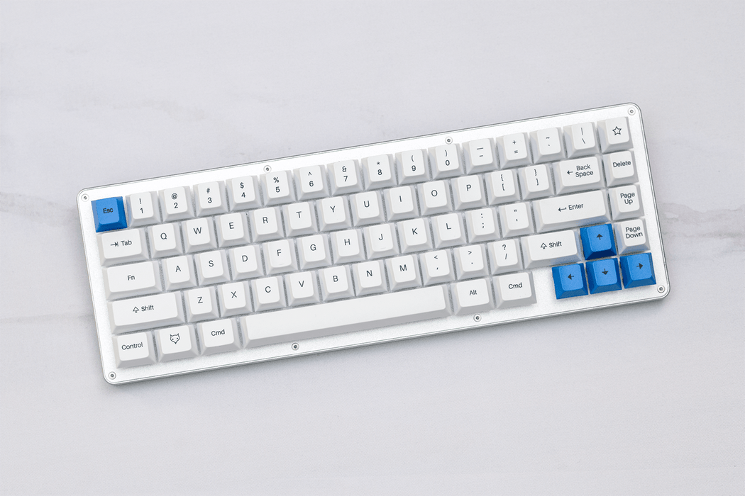 WhiteFox Mechanical Keyboard on a GMK Camping Keyset themed desk mat by Novelkeys