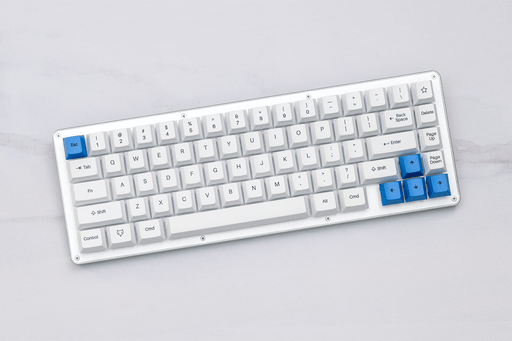 WhiteFox Mechanical Keyboard on a GMK Camping Keyset themed desk mat by Novelkeys